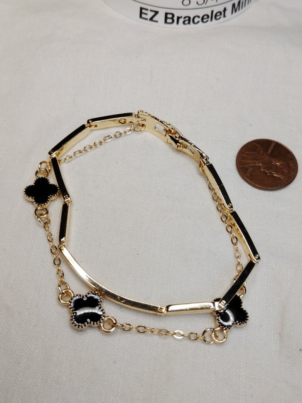 Gold Plated Dual Strand Clover Bracelet – Black Enamel Quatrefoil Charms